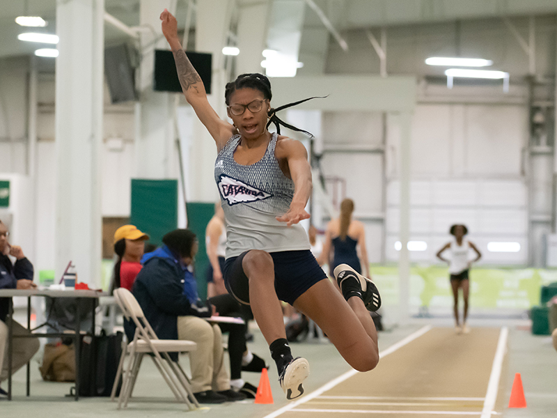 Track athlete doing long jump
