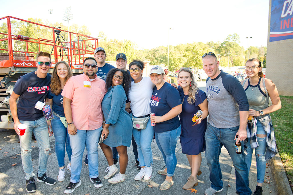 Group of alumni gathered at Homecoming