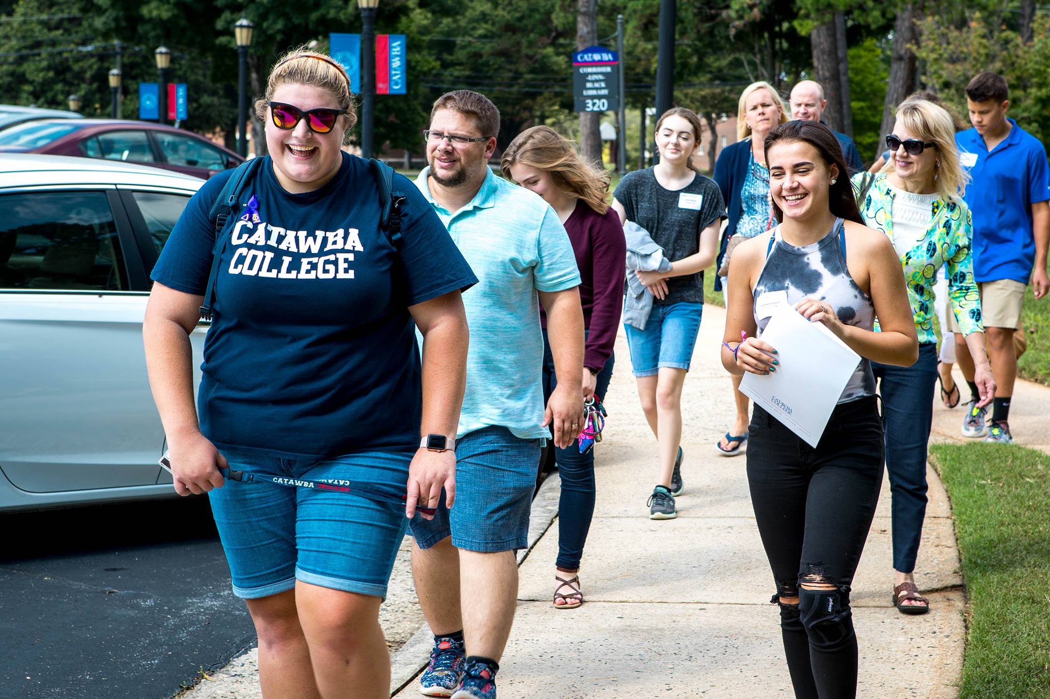 Students walking on sidewalk - safety